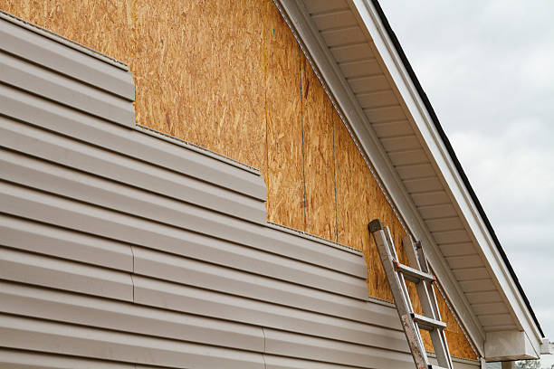 Professional Siding Installation technician working in Cambridge, MA
